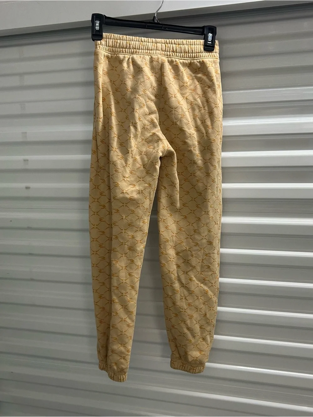 Nike Youth Light Yellow Patterned Joggers with Black Swoosh